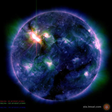 This color-coded image combines observations made by NASA's Solar Dynamics Observatory in several extreme ultraviolet wavelengths, highlighting a bright X-class flare toward the upper left of the sun's disk on March 6.